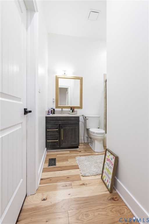 12554 Kain Road Glen Allen, VA 23059 - Photo 48 of 75 a spacious bathroom with a granite countertop sink and a mirror