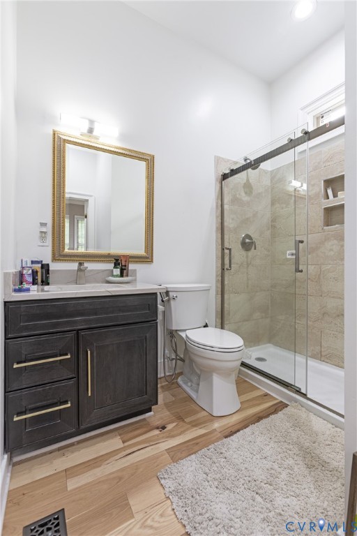 12554 Kain Road Glen Allen, VA 23059 - Photo 49 of 75 a bathroom with a sink toilet a mirror and shower