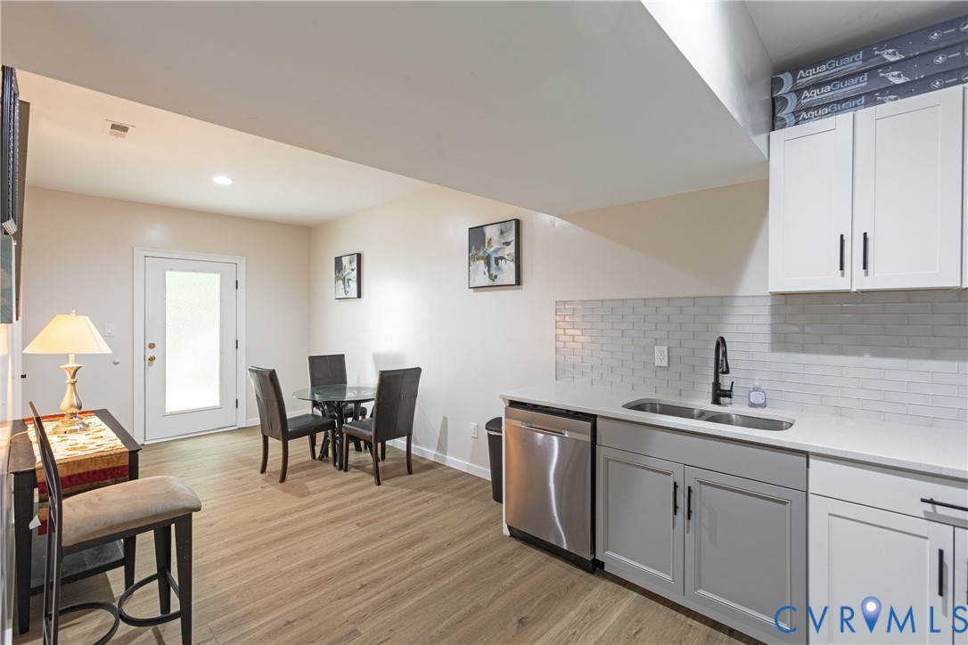 12554 Kain Road Glen Allen, VA 23059 - Photo 50 of 75 a kitchen with a sink cabinets and wooden floor