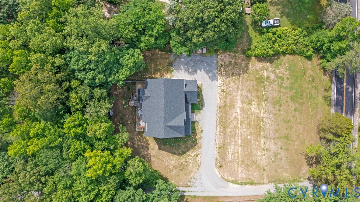 12554 Kain Road Glen Allen, VA 23059 - Photo 71 of 75 an aerial view of a house with a yard and large trees