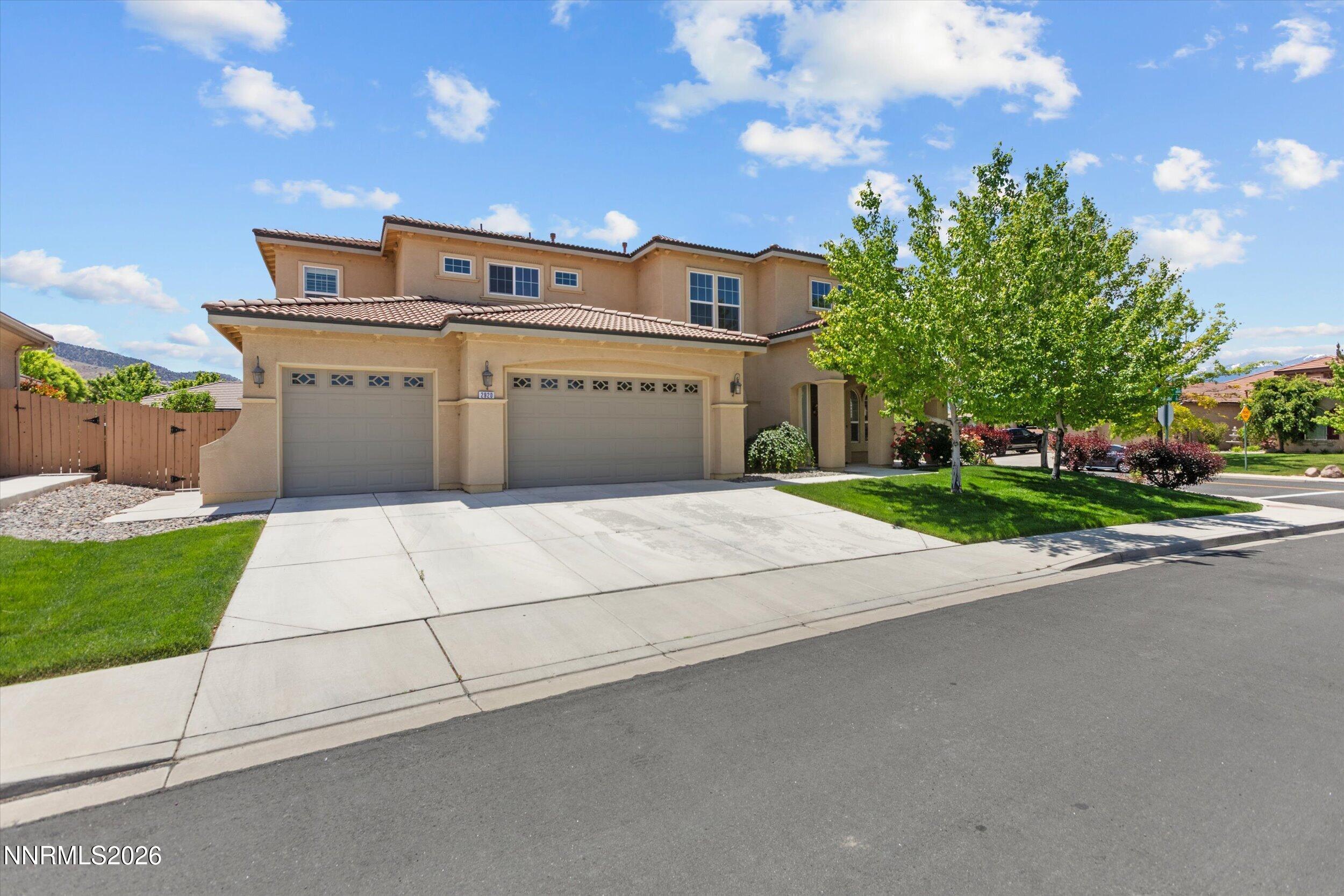 2920 Bull Rider Drive Reno, NV 89521 - Photo 2 of 51 a view of a house with a yard