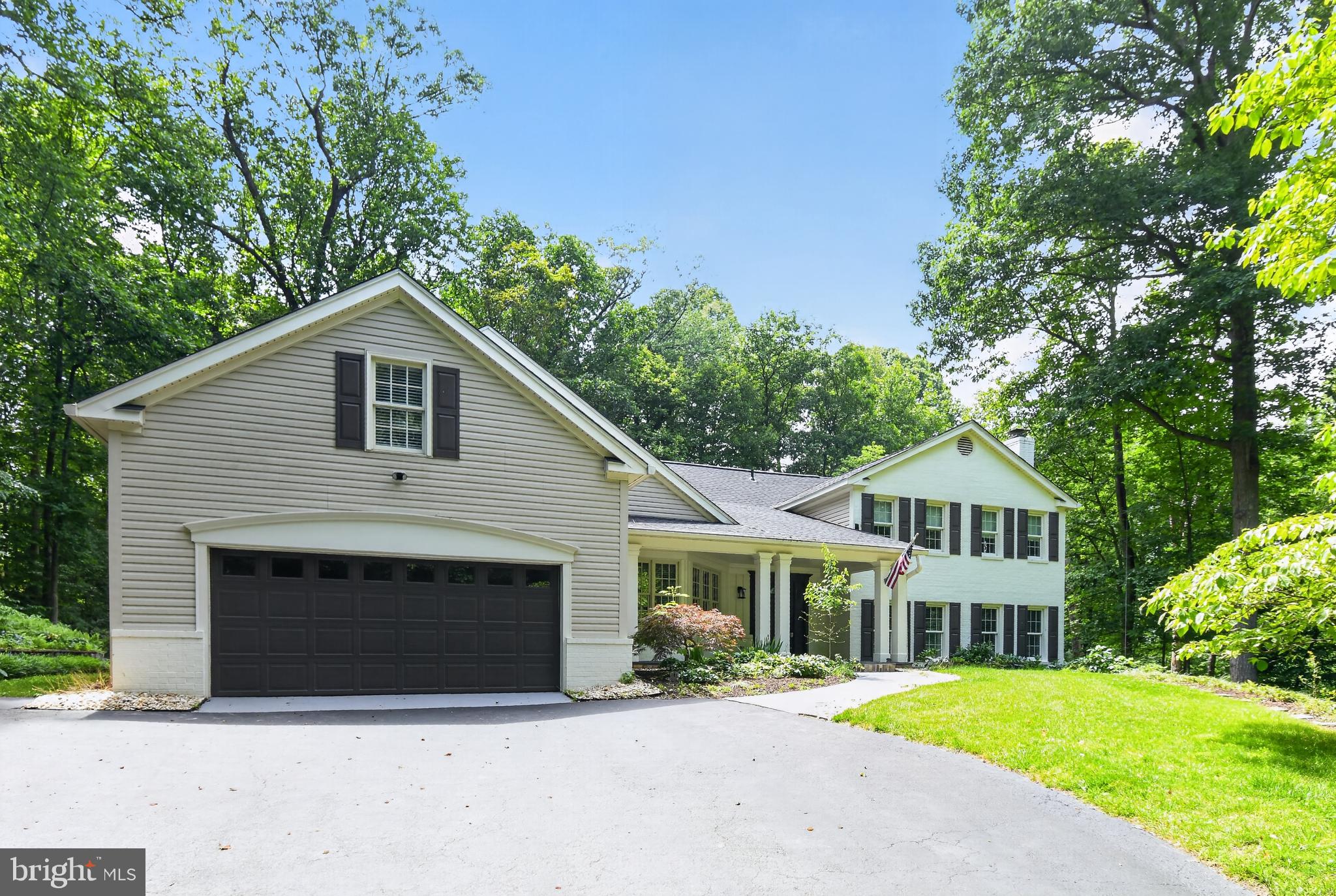 Charming home nestled in lush greenery.
