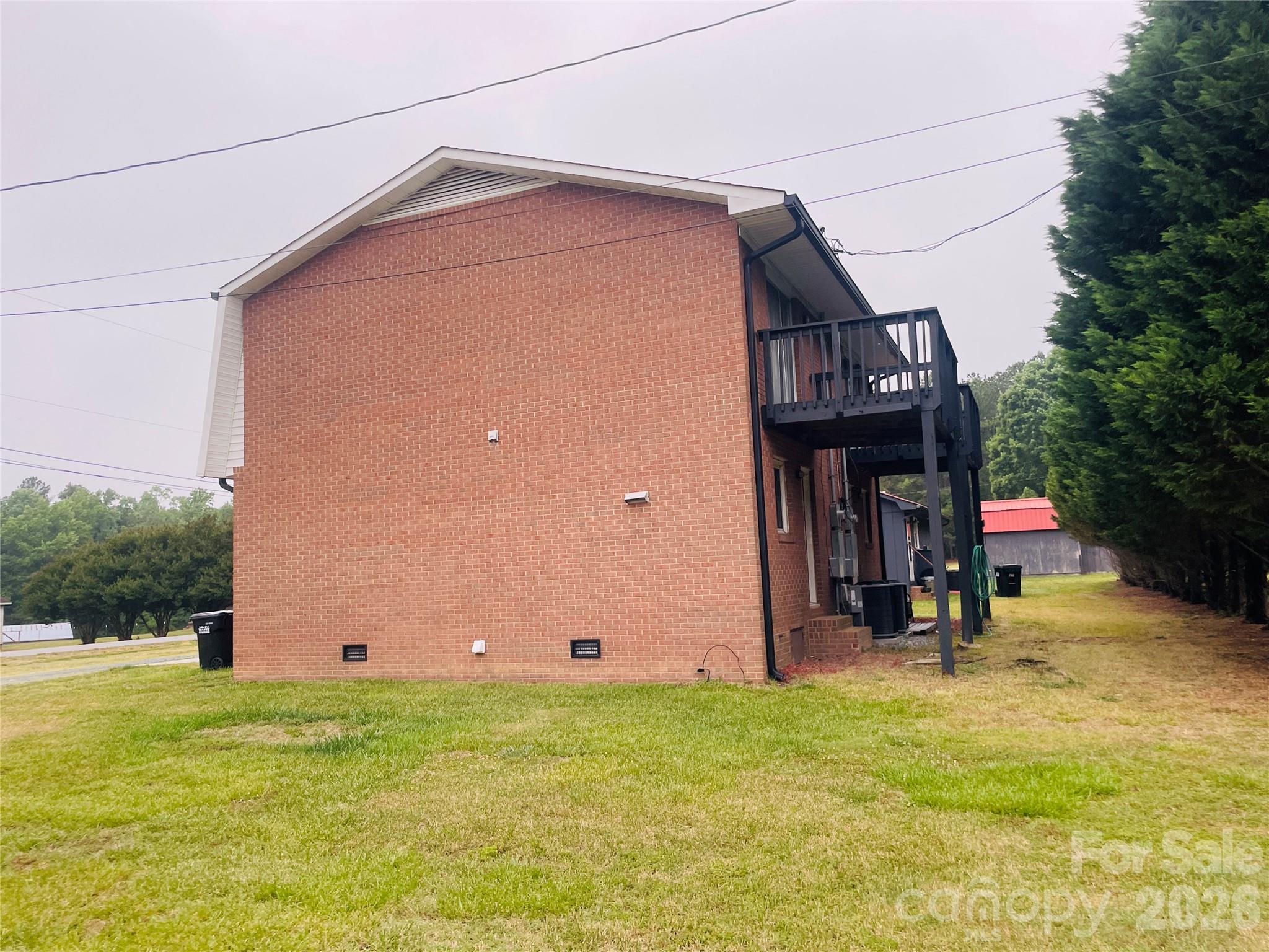 788 Coley Road Salisbury, NC 28146 - Photo 6 of 43 a view of a house with a backyard