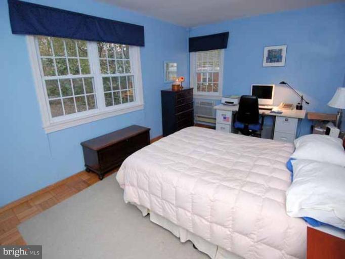 3237 Gunston Road, Unit 104 Alexandria, VA 22302 - Photo 13 of 16 a bedroom with bed and window