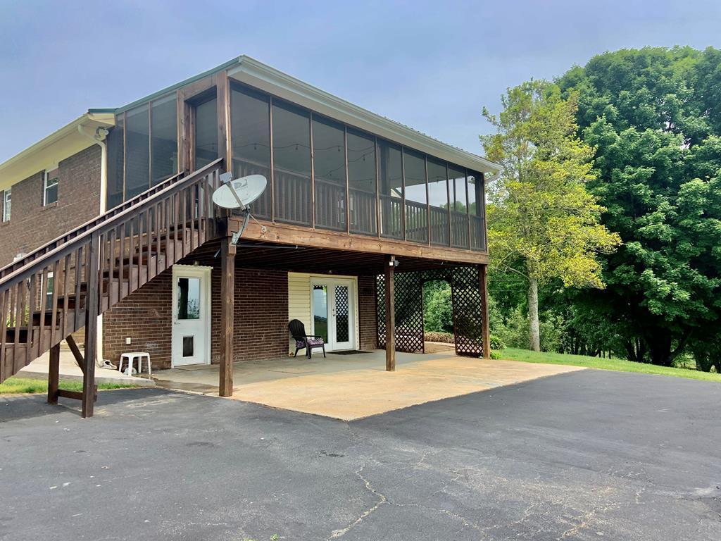 677 Sam Martin Road Dandridge, TN 37725 - Photo 30 of 38 back side of porch