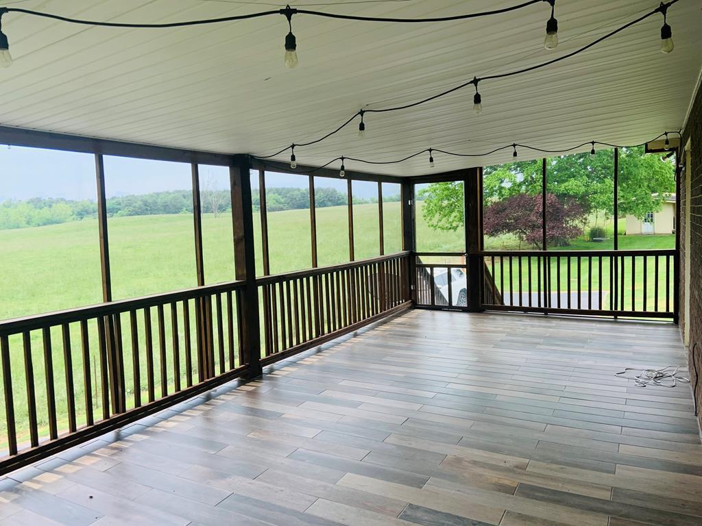 677 Sam Martin Road Dandridge, TN 37725 - Photo 32 of 38 side porch 2