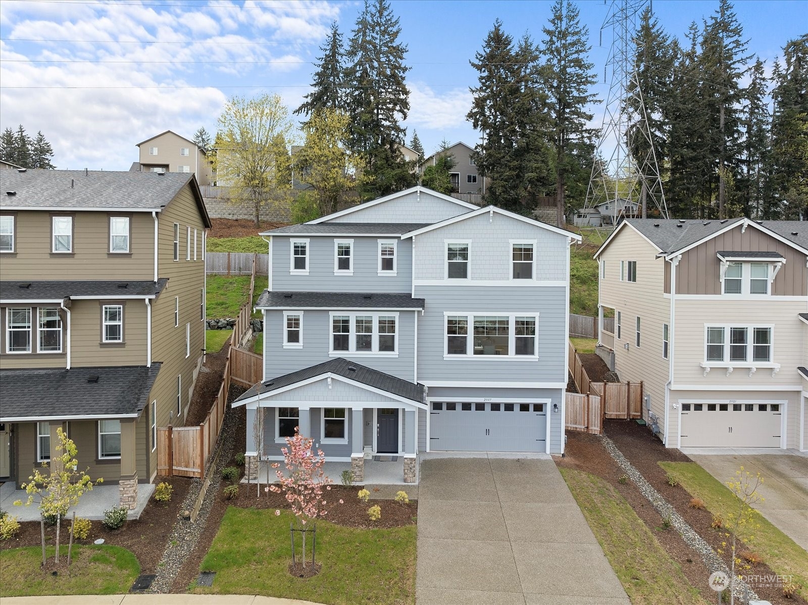 23317 41st Drive Southeast Bothell, WA 98021 - Photo 3 of 40 a front view of a house with a yard