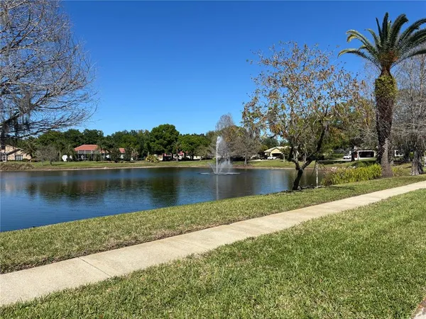 a view of a lake with houses with outdoor space