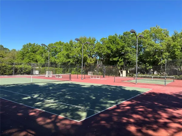 a view of a backyard of the house