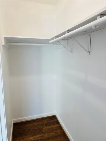 a view of small space with racks on the wall