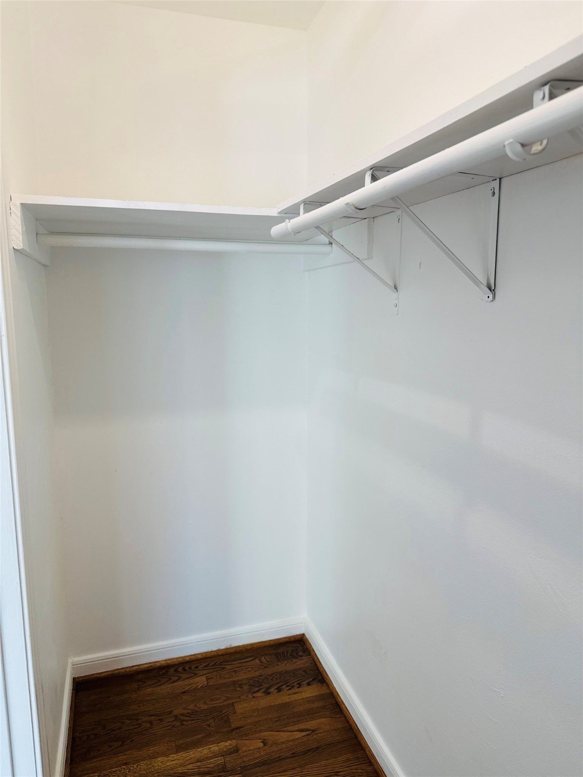 1848 Portsmouth Street, Unit 3 Houston, TX 77098 - Photo 14 of 16 a view of small space with racks on the wall