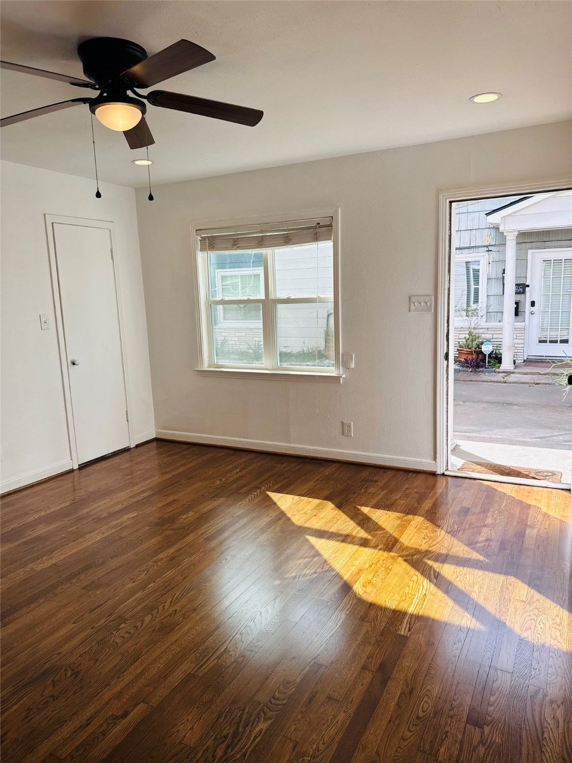 1848 Portsmouth Street, Unit 3 Houston, TX 77098 - Photo 9 of 16 a view of a room wooden floor and window