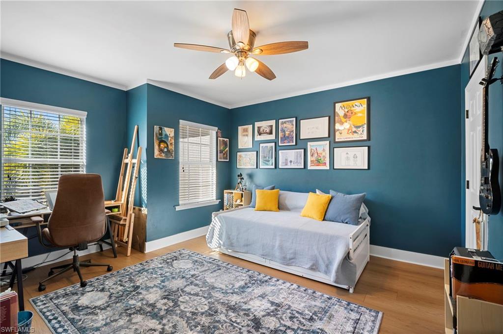 19501 Bowring Park Road, Unit 102 Fort Myers, FL 33967 - Photo 18 of 33 a living room with furniture and a rug