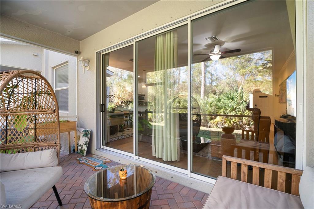 19501 Bowring Park Road, Unit 102 Fort Myers, FL 33967 - Photo 29 of 33 a room with furniture and large window