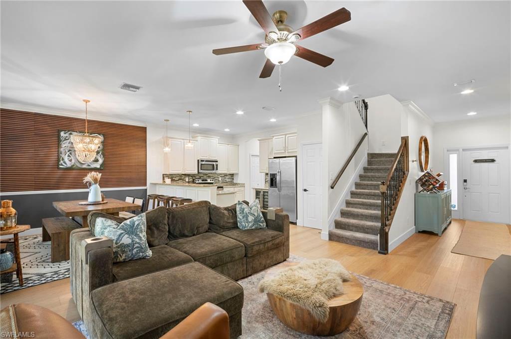 19501 Bowring Park Road, Unit 102 Fort Myers, FL 33967 - Photo 6 of 33 a living room with furniture and kitchen view