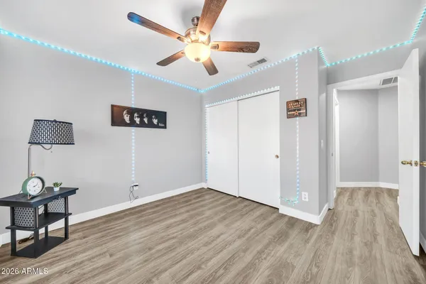 a view of a livingroom with wooden floor