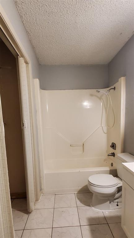 9696 Walnut Street, Unit 106 Dallas, TX 75243 - Photo 13 of 13 a bathroom with a toilet and a shower