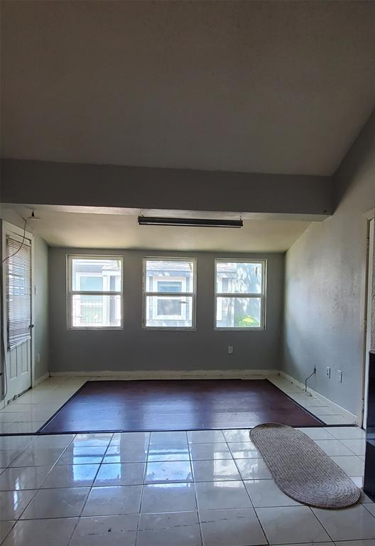 9696 Walnut Street, Unit 106 Dallas, TX 75243 - Photo 9 of 13 a view of an empty room with windows