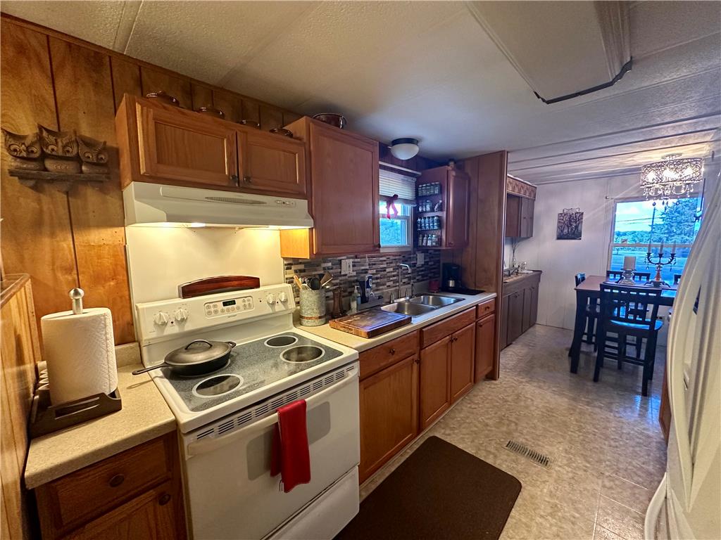 381 Red Oak Lane Bath, PA 18014 - Photo 7 of 27 A well-appointed kitchen features ample cabinetry and a convenient dining area for everyday meals.