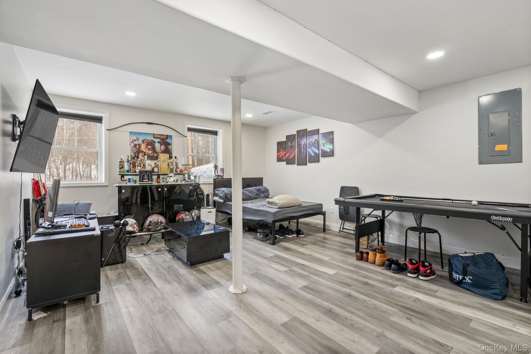 171 High Barney Road Middletown, NY 10940 - Photo 13 of 22 a living room with furniture and a flat screen tv
