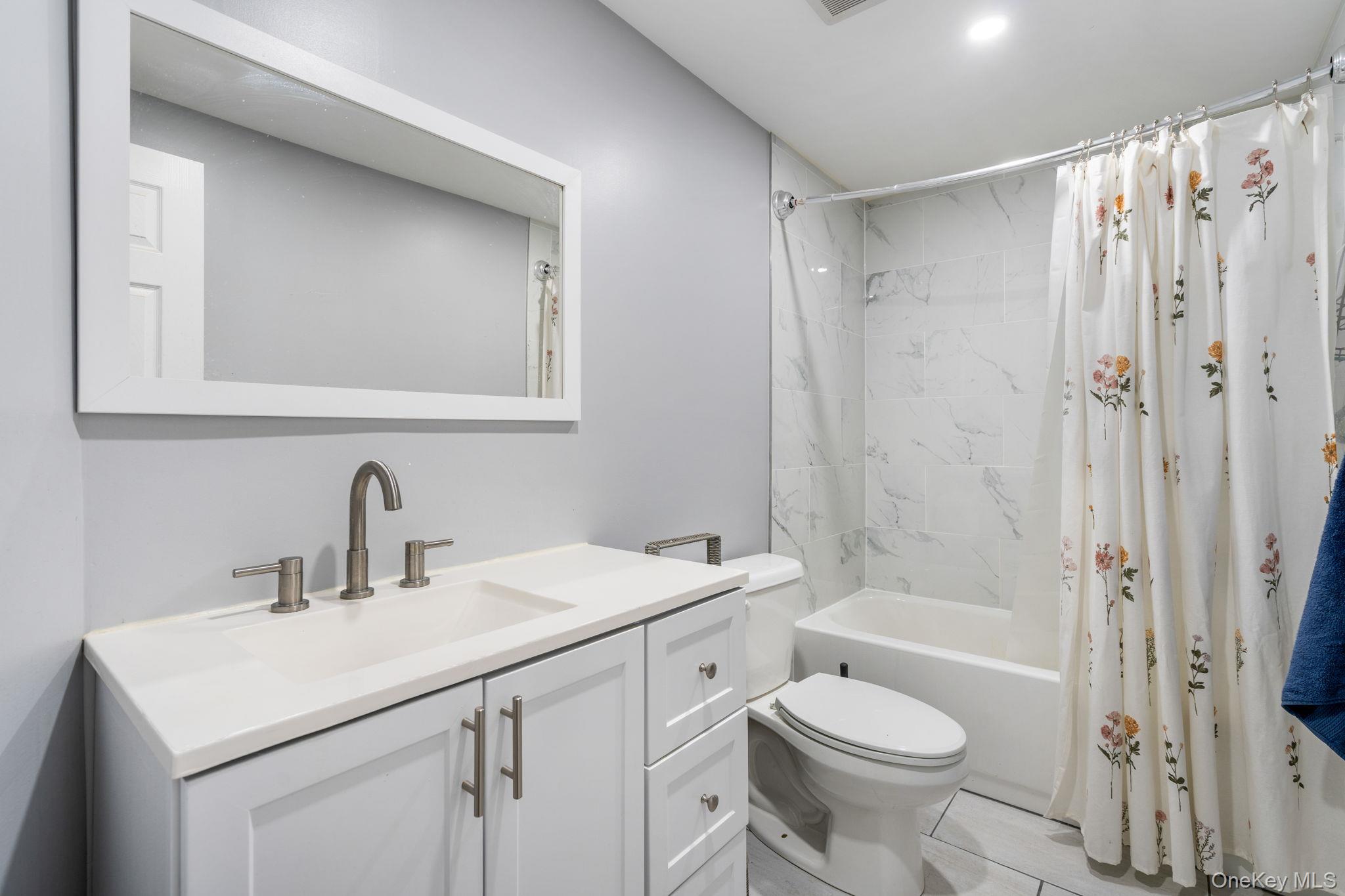 171 High Barney Road Middletown, NY 10940 - Photo 17 of 22 a bathroom with a sink toilet and shower