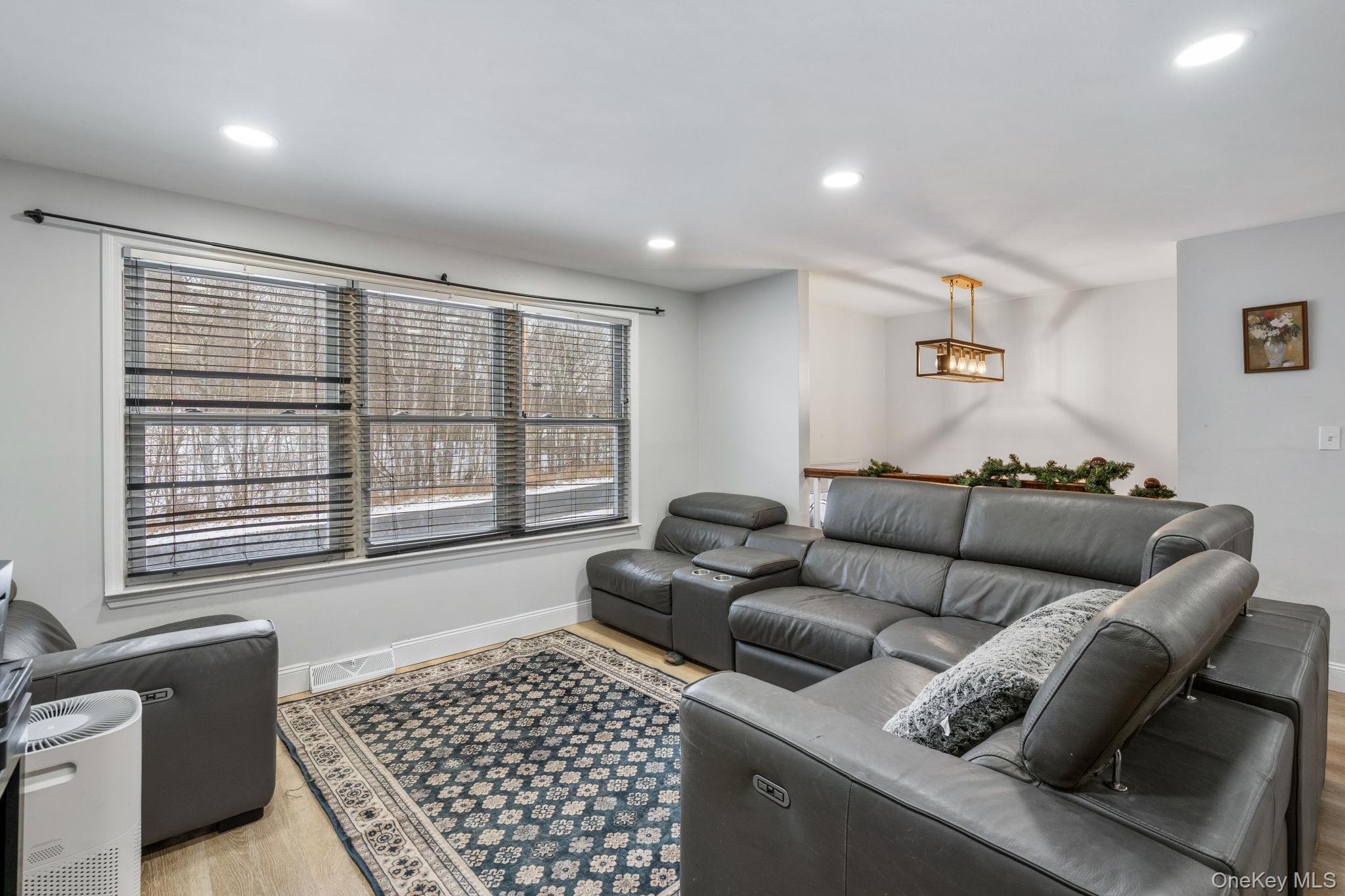 171 High Barney Road Middletown, NY 10940 - Photo 3 of 19 a living room with furniture and a window