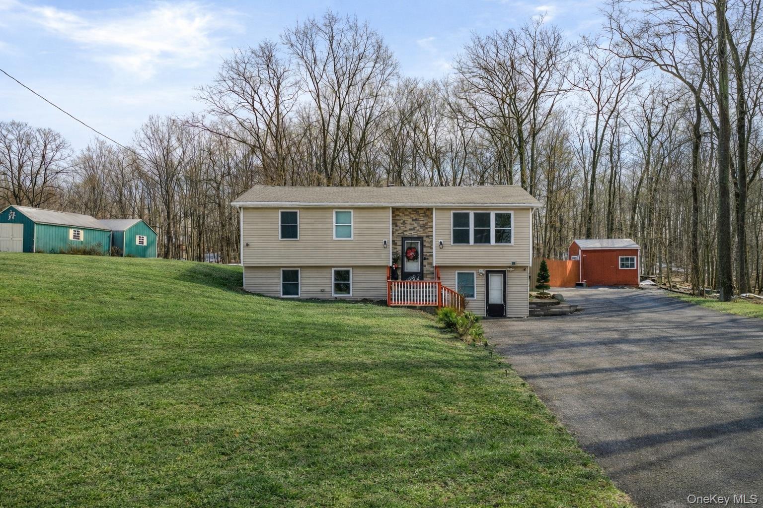171 High Barney Road Middletown, NY 10940 - Photo 3 of 22 a front view of house with yard and trees