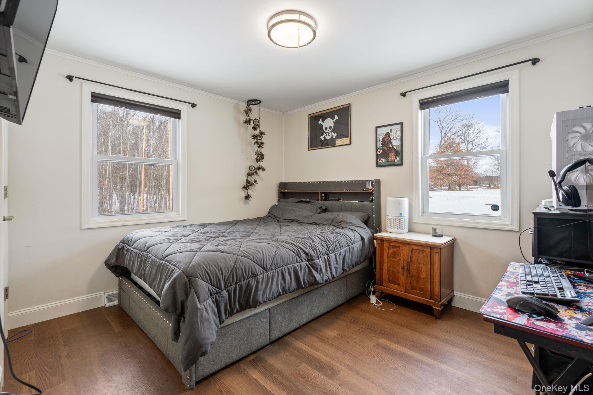 171 High Barney Road Middletown, NY 10940 - Photo 7 of 19 a bedroom with a bed and a flat screen tv
