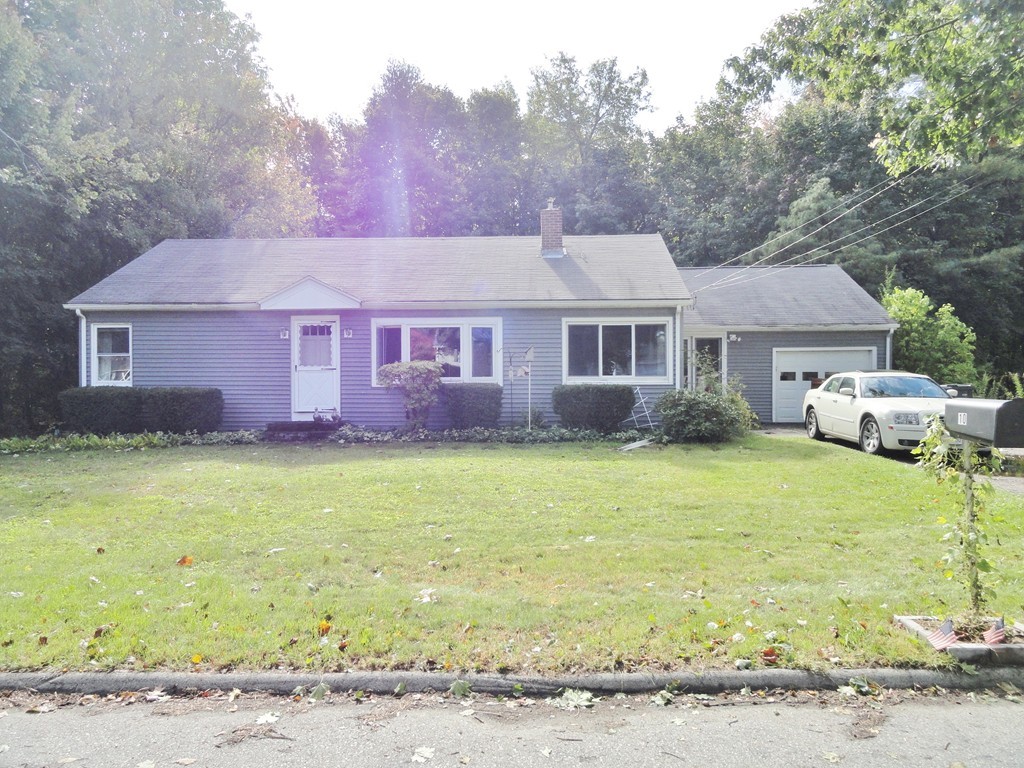 10 Inwood Road Rutland, MA 01543 - Photo 1 of 21 a front view of a house with a garden