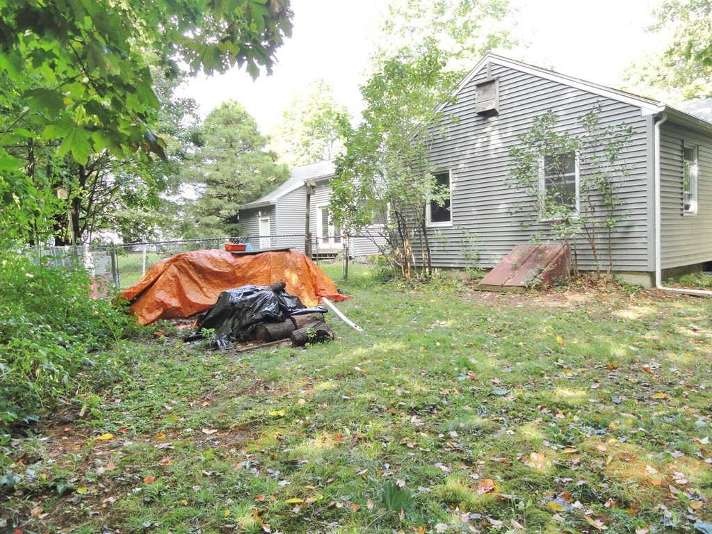 10 Inwood Road Rutland, MA 01543 - Photo 21 of 21 a backyard of a house with table and chairs