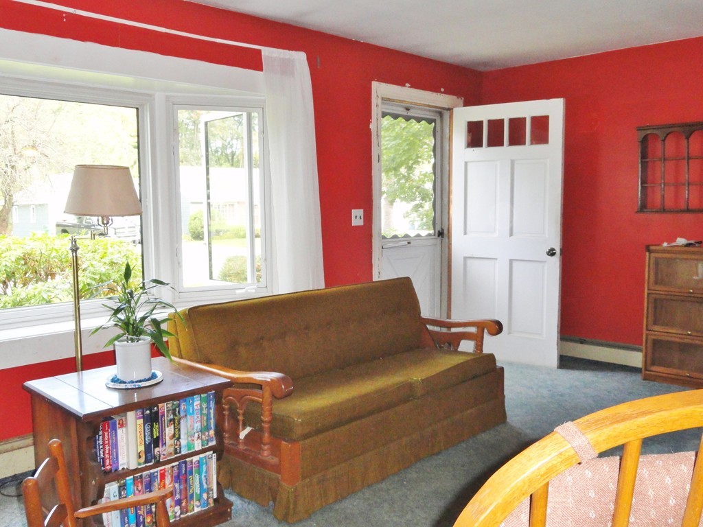 10 Inwood Road Rutland, MA 01543 - Photo 8 of 21 a living room with furniture and a potted plant