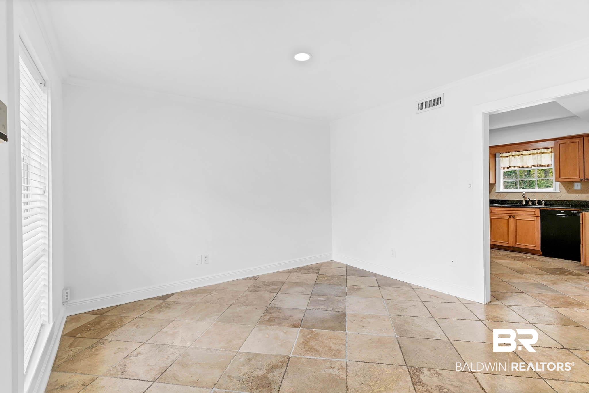 4705 Sherry Court Mobile, AL 36693 - Photo 10 of 100 Empty room with recessed lighting, crown molding, and light tile patterned flooring