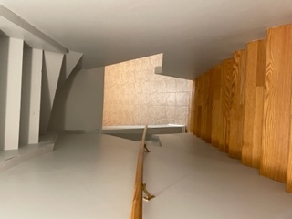 8950 East Prairie Road Evanston, IL 60203 - Photo 23 of 25 a view of an empty room with wooden floor and a window