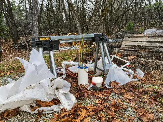 a view of a chairs and table in the patio