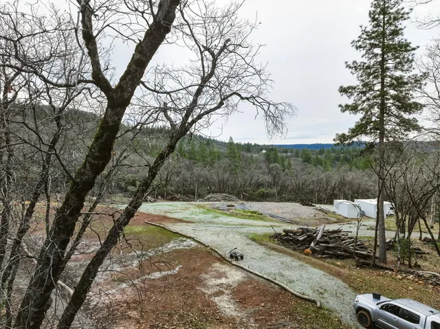 a view of a road with a yard