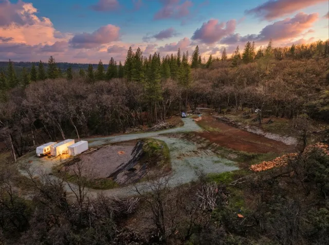a view of a town with trees