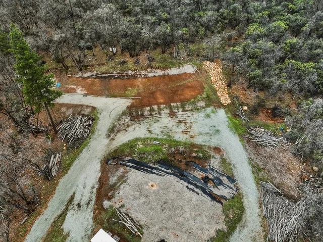 a view of a yard with wooden floor and lake view