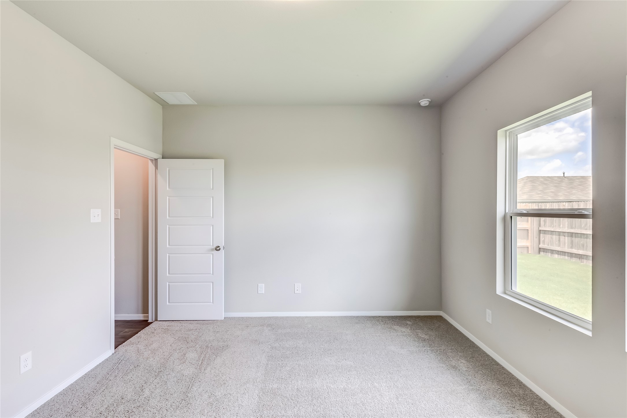 274 Jade Street Maxwell, TX 78656 - Photo 9 of 36 a view of an empty room with a window