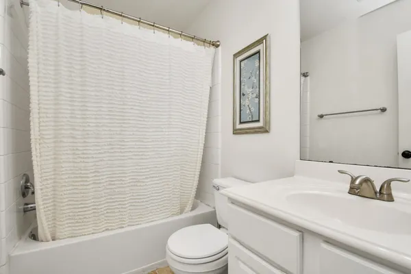 an aerial view of a house with outdoor space pool seating area and fire pit