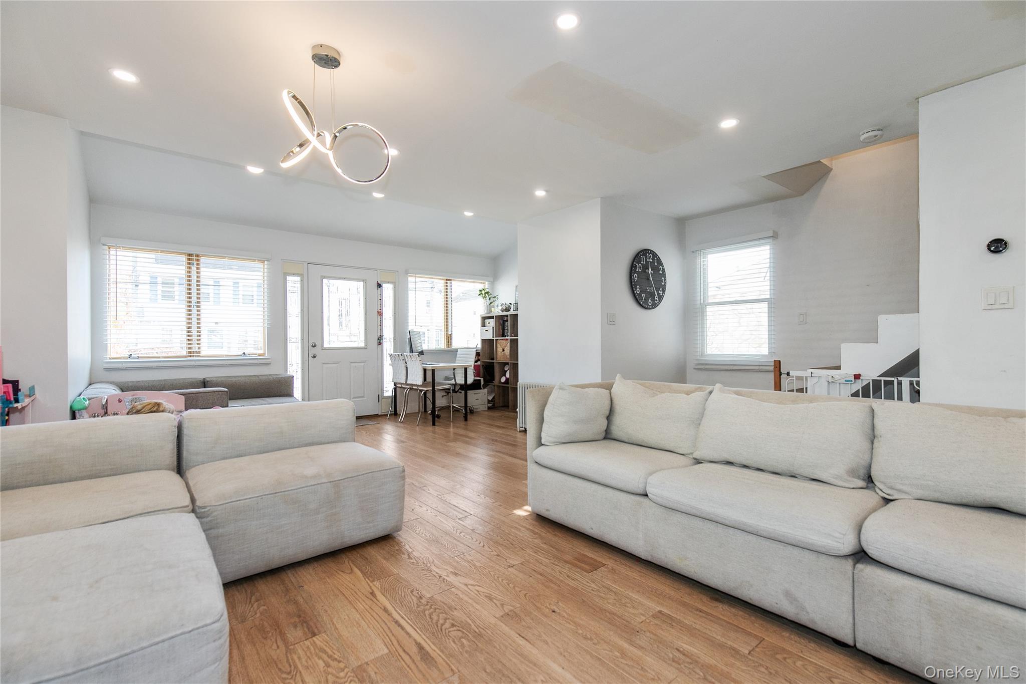 34 Avondale Street Valley Stream, NY 11581 - Photo 3 of 20 a living room with furniture and a large window