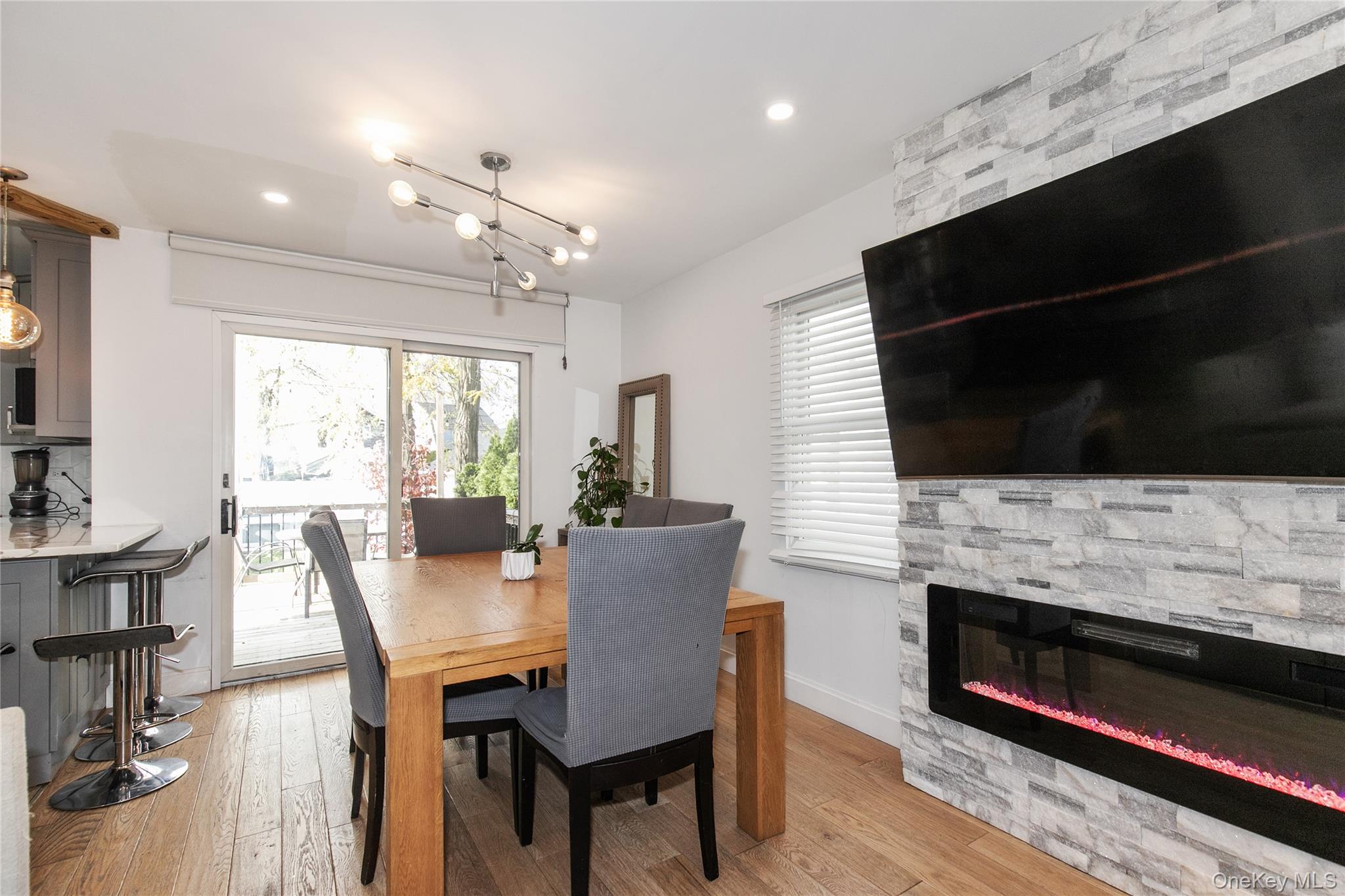 34 Avondale Street Valley Stream, NY 11581 - Photo 6 of 20 a living room with furniture and a flat screen tv