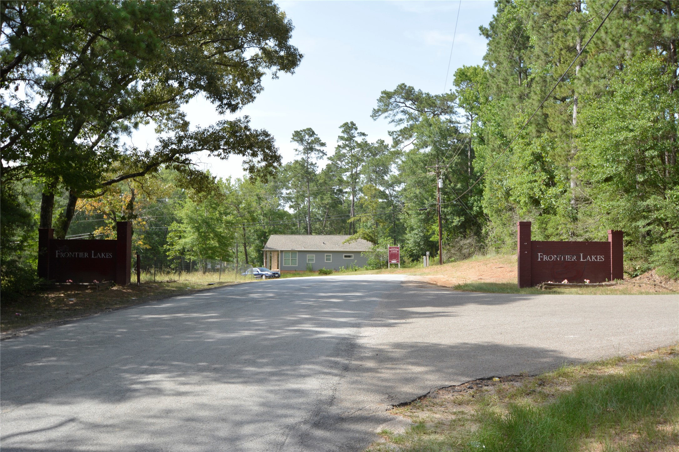14871 Fannin Road Willis, TX 77378 - Photo 4 of 4 a view of a street with a trees