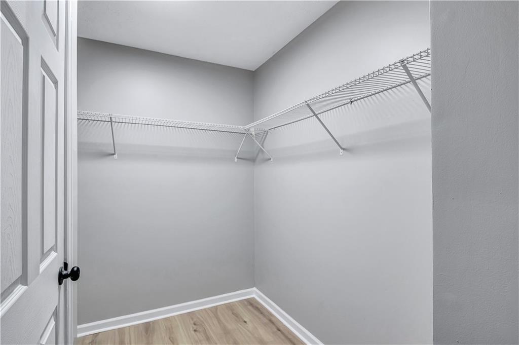 4061 Jewel Terrace Conley, GA 30288 - Photo 25 of 36 a view of a room with racks on the wall