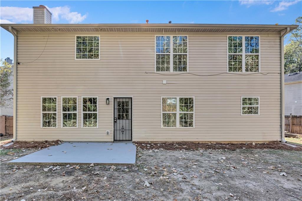 4061 Jewel Terrace Conley, GA 30288 - Photo 36 of 36 a front view of a house with a yard