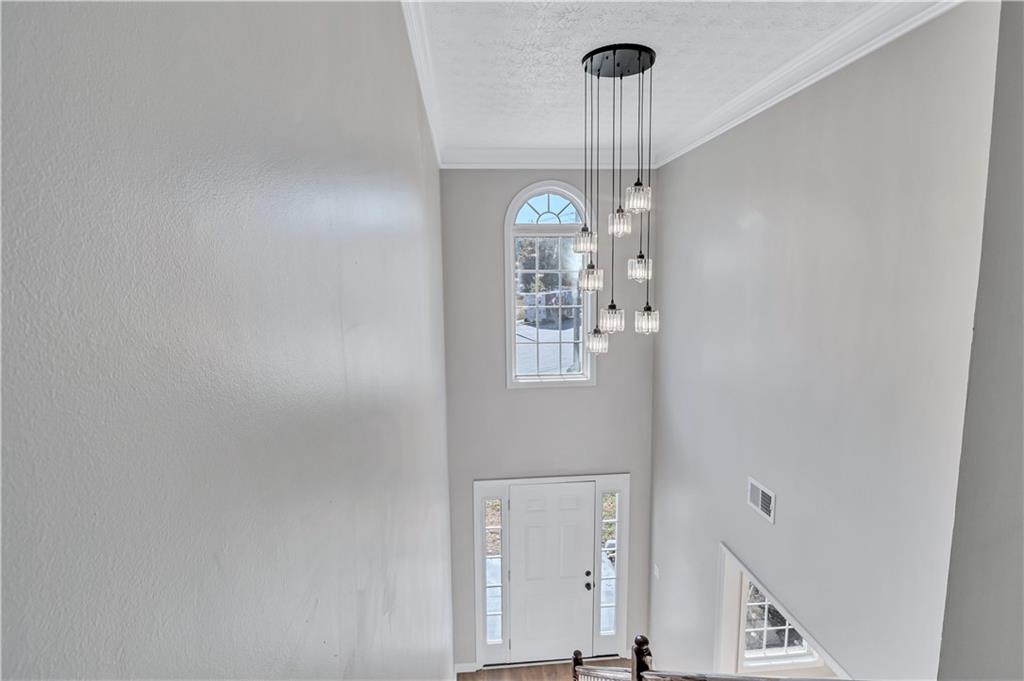 4061 Jewel Terrace Conley, GA 30288 - Photo 5 of 36 a view of a hallway with windows