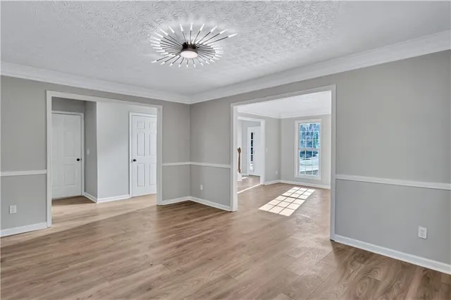 a view of entryway with wooden floor