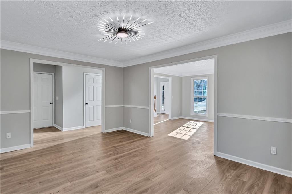 4061 Jewel Terrace Conley, GA 30288 - Photo 9 of 36 a view of entryway with wooden floor
