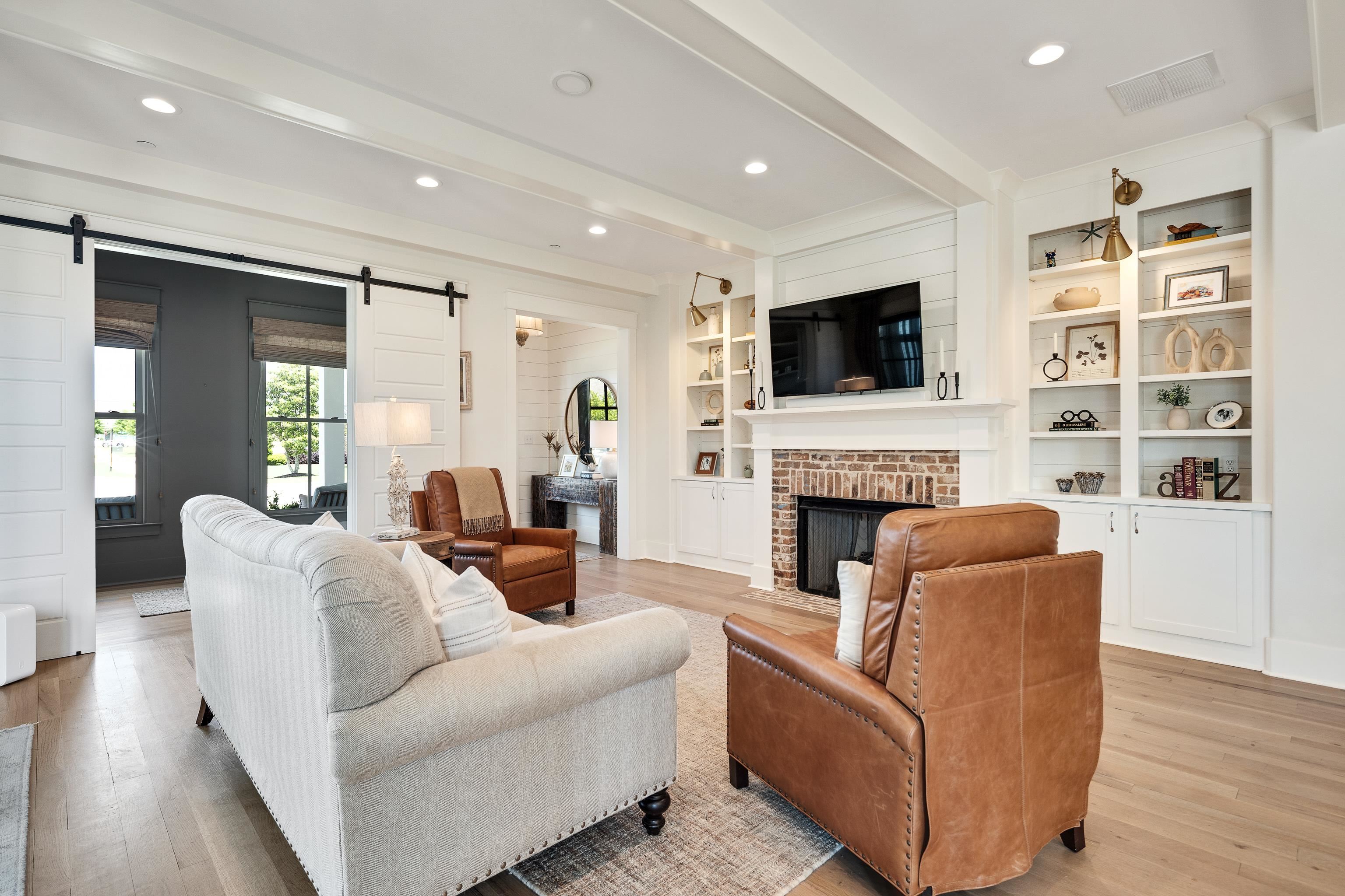 100 Sunflower View Road Piperton, TN 38017 - Photo 7 of 29 Living area featuring wood-finish flooring and recessed lighting