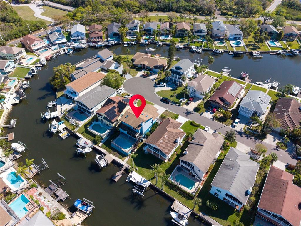 6241 Bayside Drive New Port Richey, FL 34652 - Photo 5 of 78 an aerial view of a houses with a swimming pool