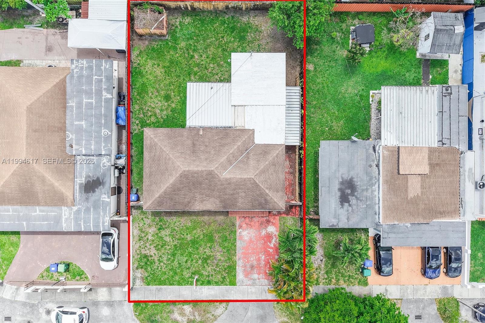 6810 Southwest 1st Street Miami, FL 33144 - Photo 14 of 17 an aerial view of multiple houses with outdoor space